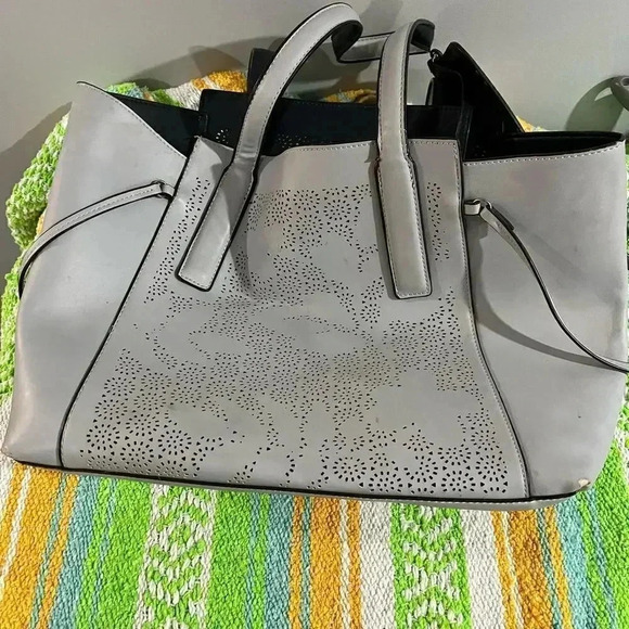 Handbags - Beautiful faux leather laser cut tote with attached inside bag GUC